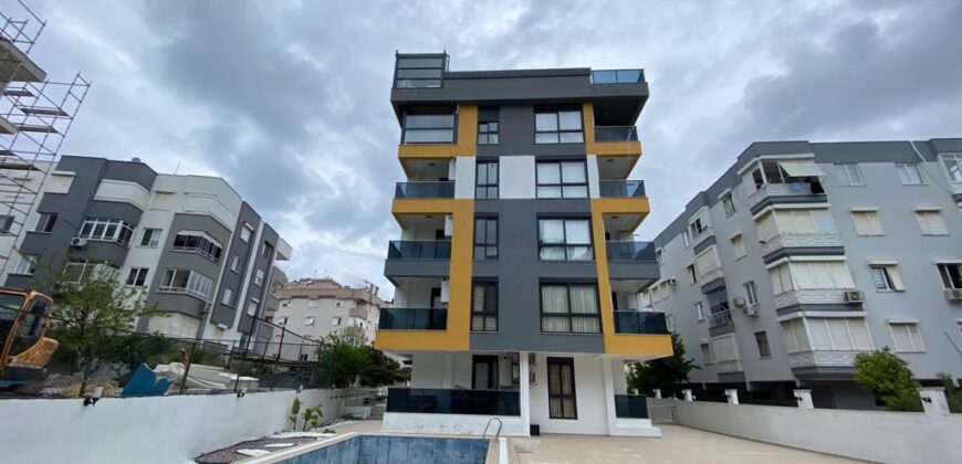 BUY PROPERTY İN ŞİRİNYALI NEW BUILDING WITH SEA VIEW