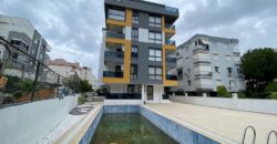 BUY PROPERTY İN ŞİRİNYALI NEW BUILDING WITH SEA VIEW